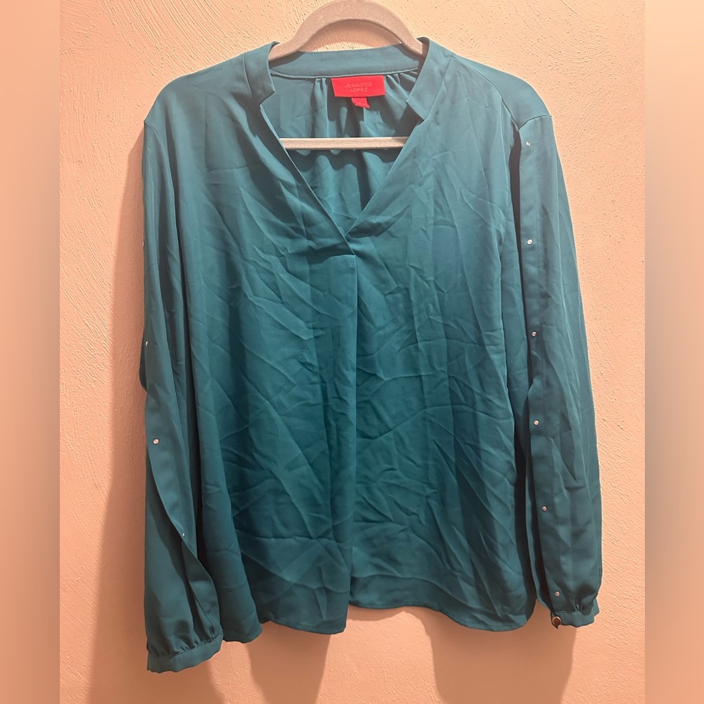Turquoise top with pretty sleeves